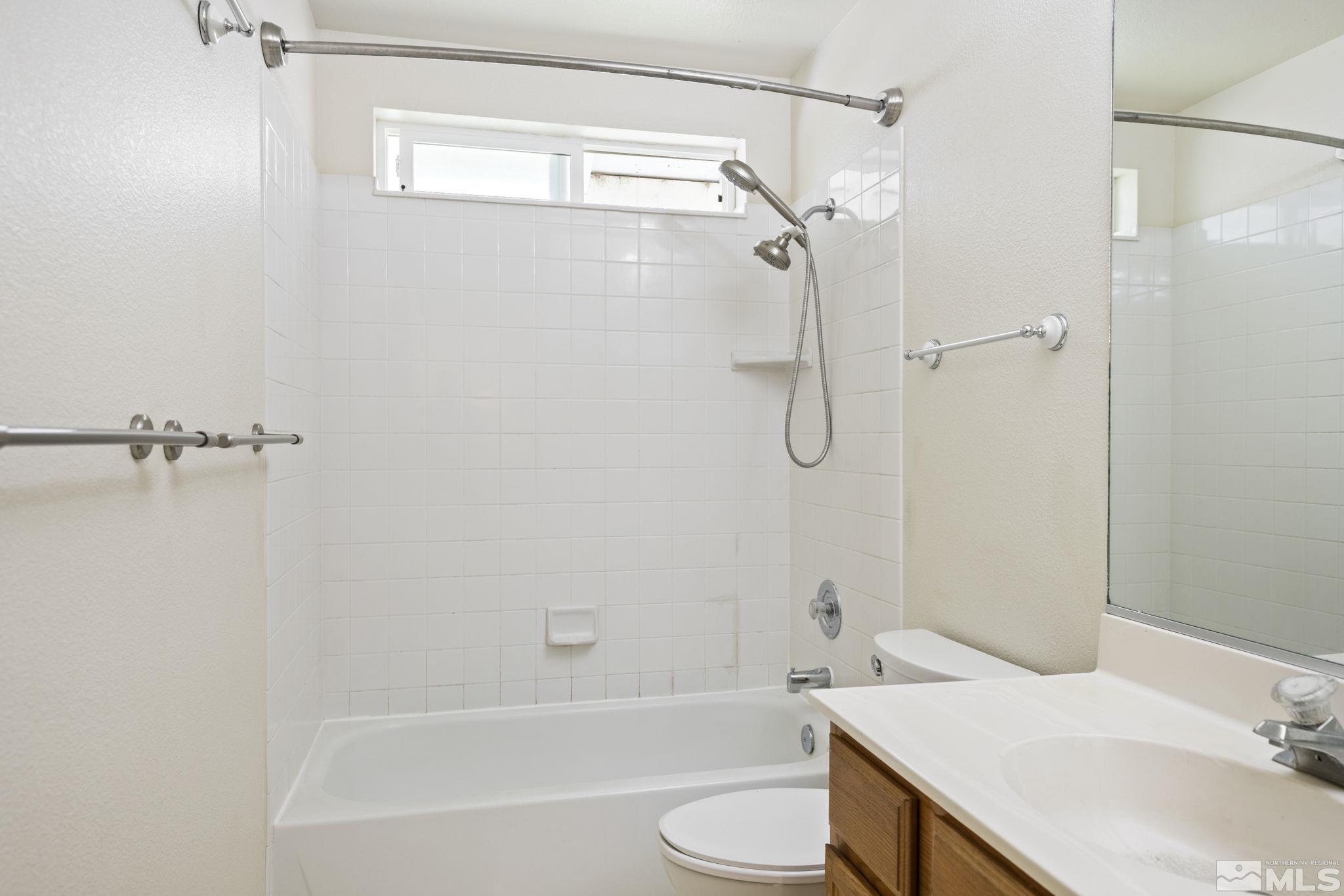 403 Aspen Drive Dayton, NV 89403 - Photo 28 of 36 a bathroom with a sink toilet and shower