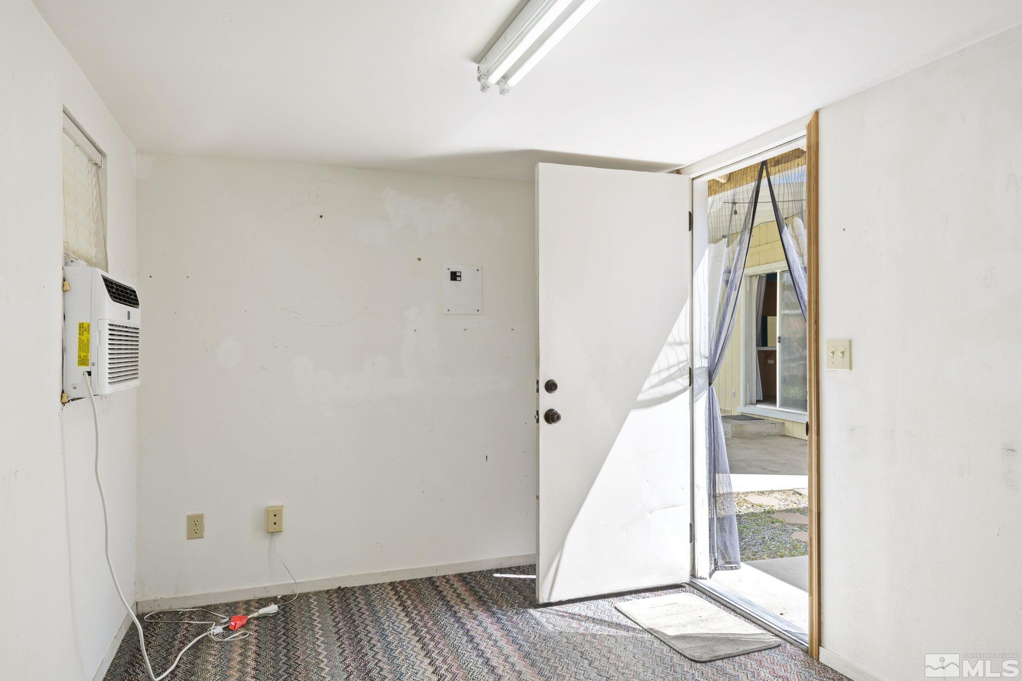 403 Aspen Drive Dayton, NV 89403 - Photo 31 of 36 a view of a hallway with staircase