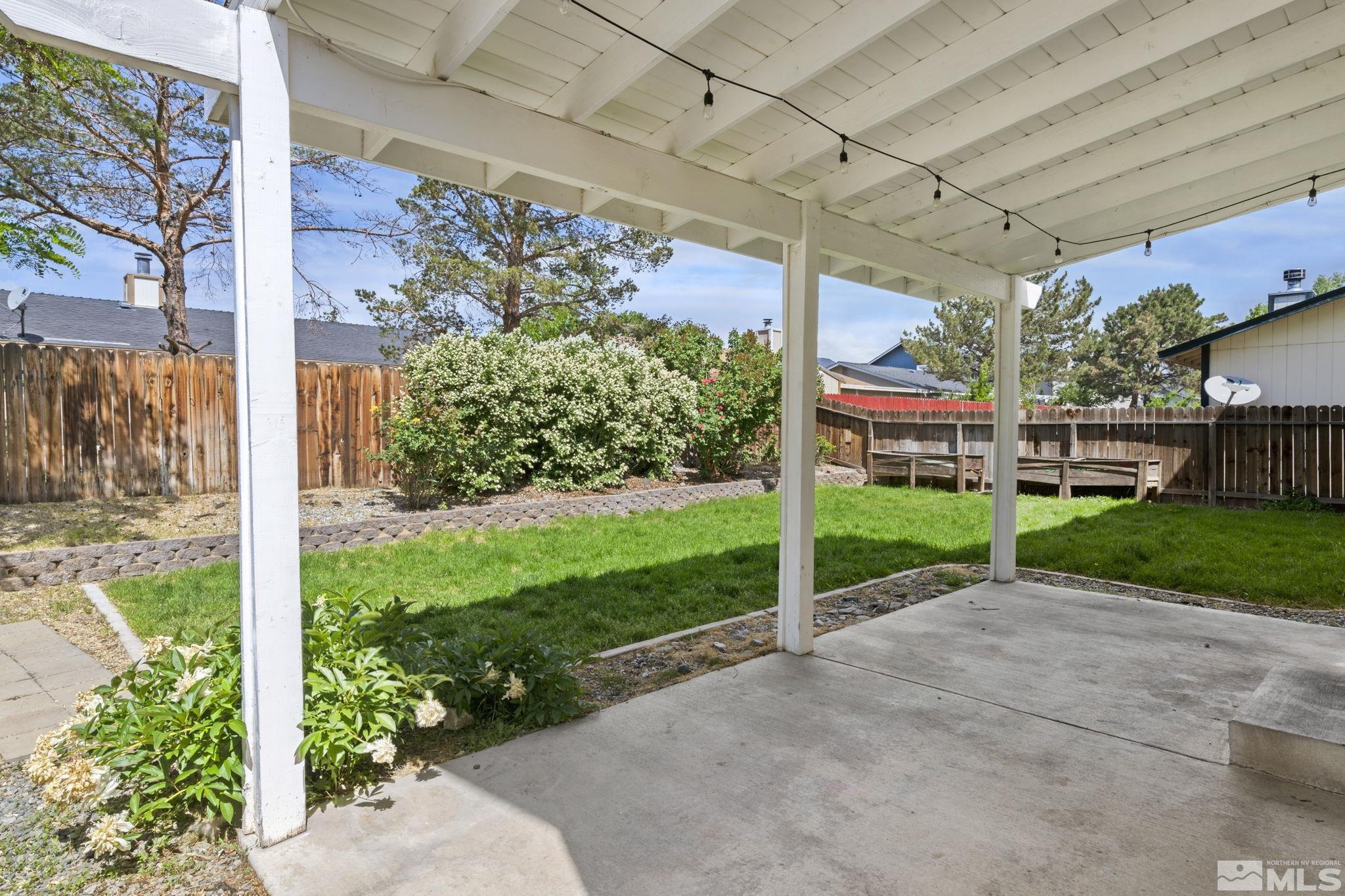 403 Aspen Drive Dayton, NV 89403 - Photo 34 of 36 a view of a chair and table in backyard of a house