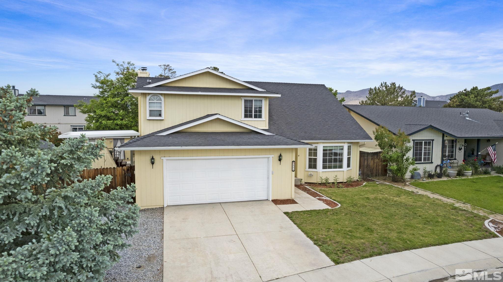 403 Aspen Drive Dayton, NV 89403 - Photo 5 of 36 front view of a house with a yard