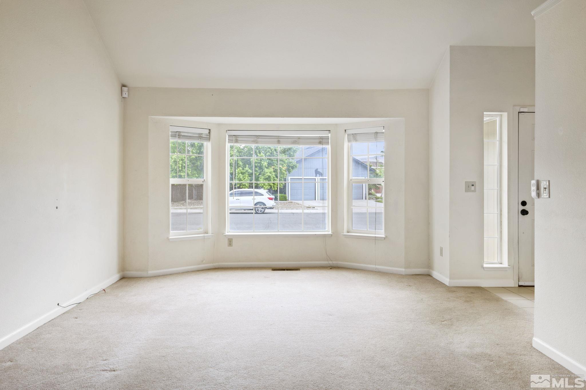 403 Aspen Drive Dayton, NV 89403 - Photo 8 of 36 an empty room with windows