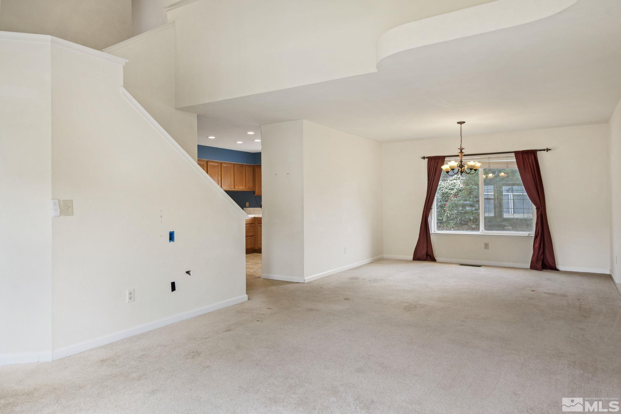 403 Aspen Drive Dayton, NV 89403 - Photo 10 of 36 a view of an empty room with a window