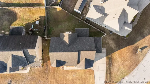 a view of living room kitchen and entryway
