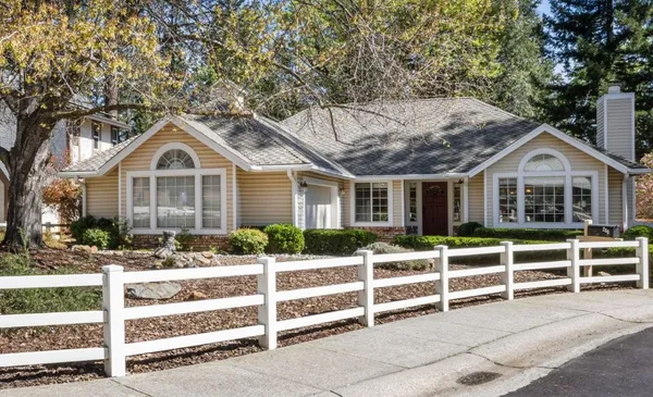 front view of a house with a small yard