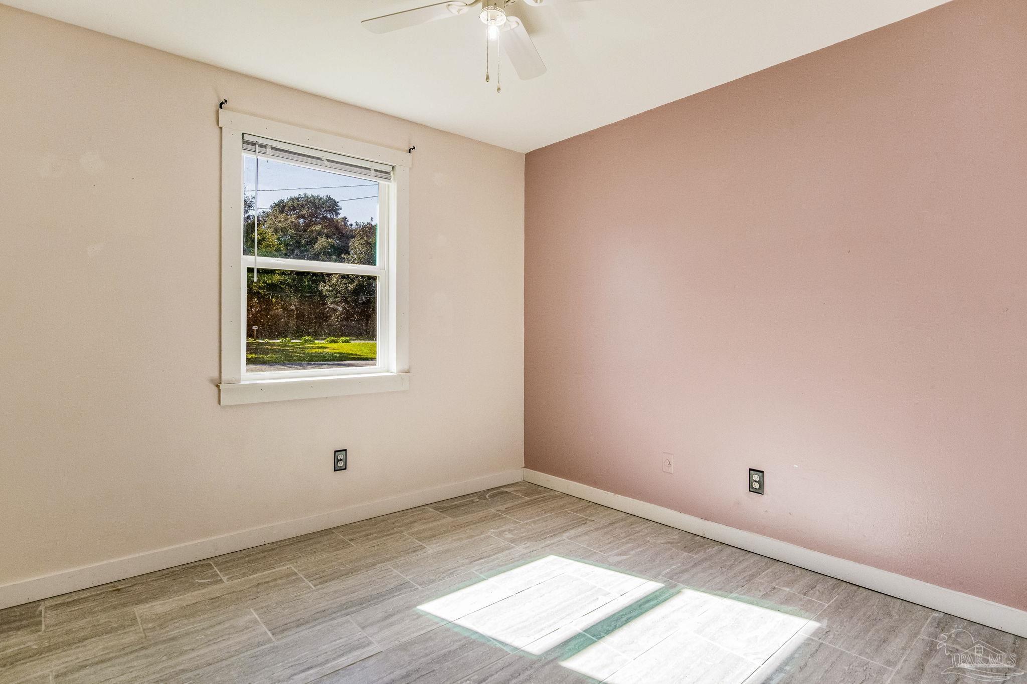 5254 Jenny Circle Pace, FL 32571 - Photo 24 of 44 an empty room with a workspace