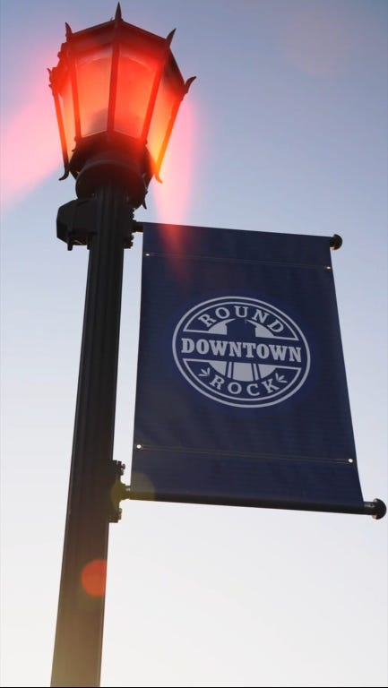 301 North Lewis Street Round Rock, TX 78664 - Photo 12 of 12 a black and white photo of a fireplace