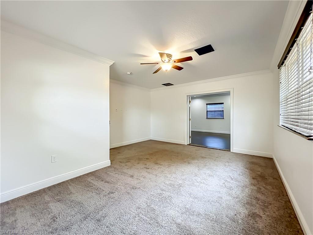 4210 South Hiawassee Road Orlando, FL 32835 - Photo 23 of 49 a view of an empty room and a window