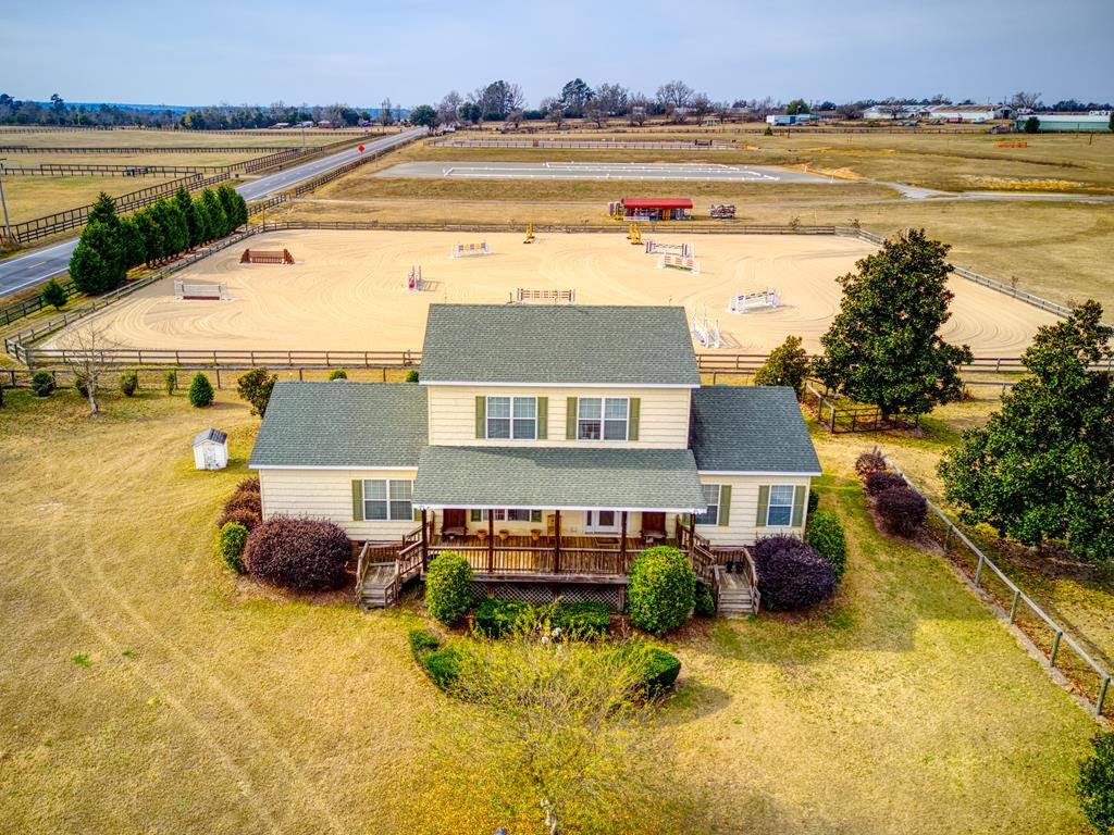 4069 Wagener Road Aiken, SC 29805 - Photo 1 of 33 a view of a house with swimming pool and sitting area