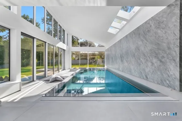 a living room with large windows