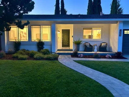 a living room with furniture and a couch