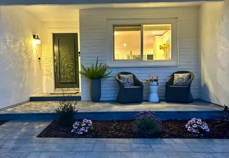 a living room with furniture and a couch