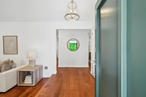 a kitchen with a sink and a stove
