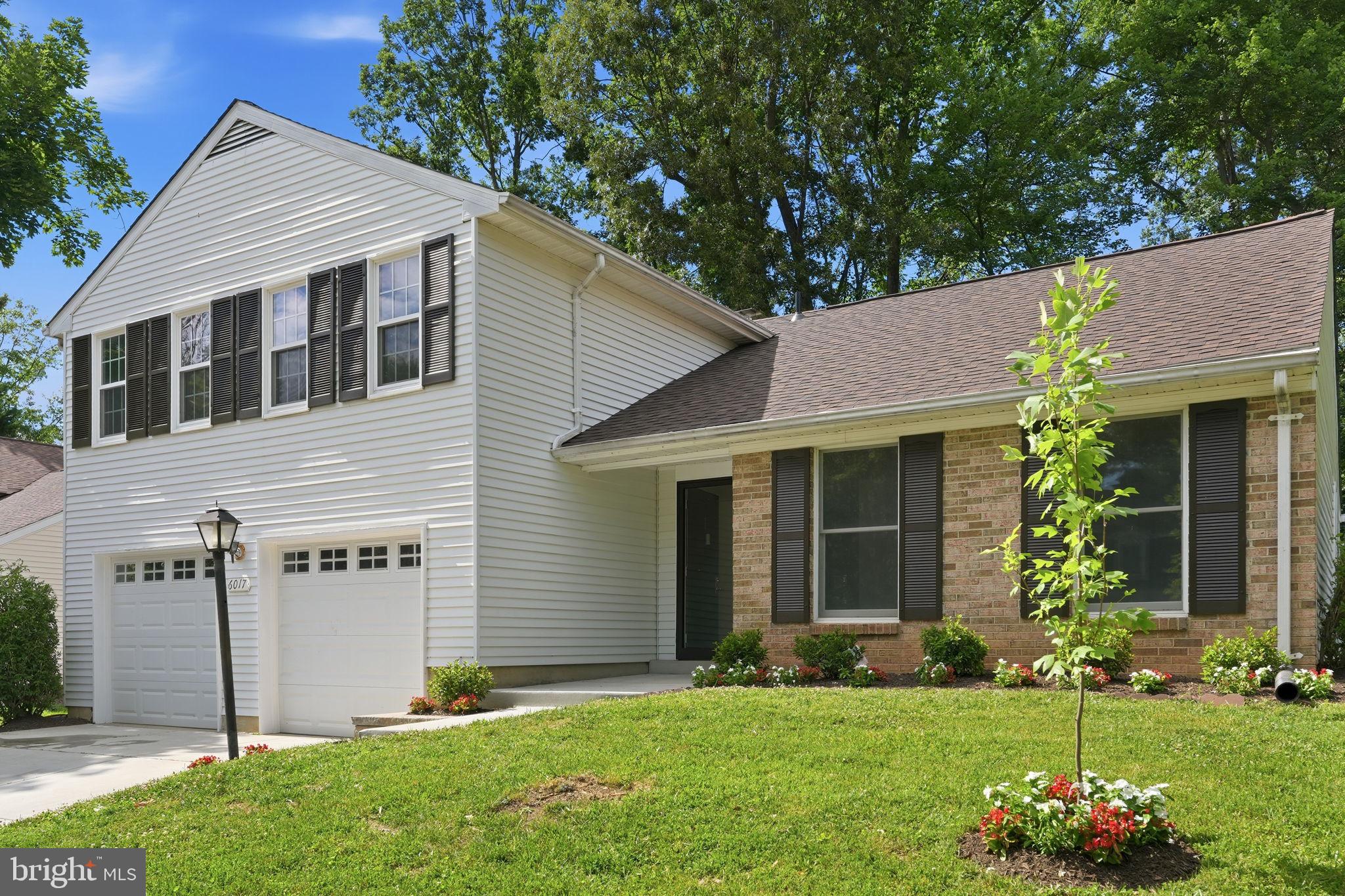6017 Misty Arch Run Columbia, MD 21044 - Photo 1 of 39 Charming home with lush greenery.