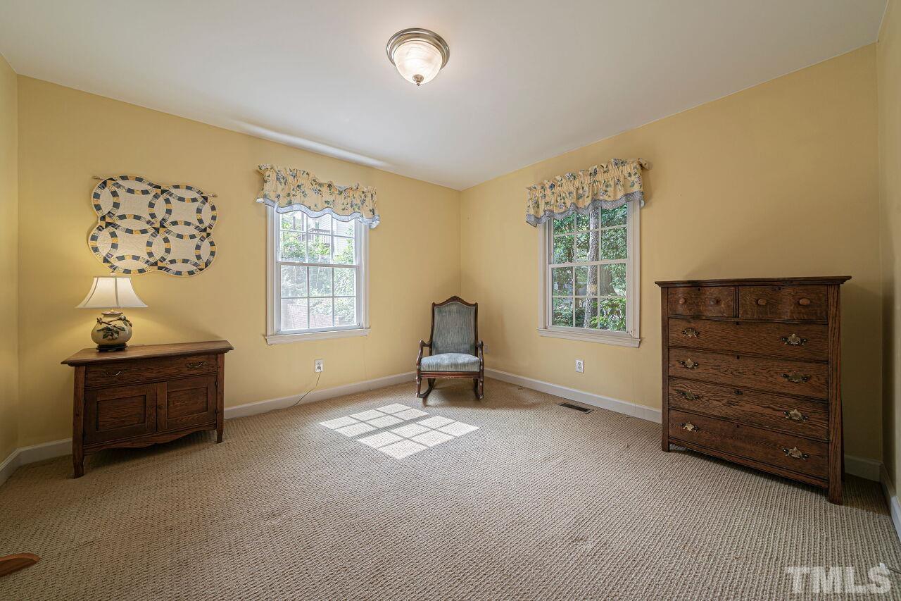 2617 Grant Avenue Raleigh, NC 27608 - Photo 13 of 28 a living room with furniture and a window