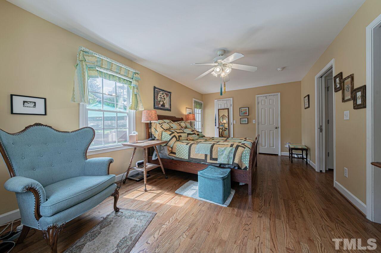 2617 Grant Avenue Raleigh, NC 27608 - Photo 18 of 28 a living room with furniture and a wooden floor