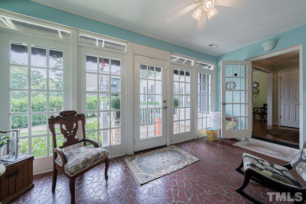 2617 Grant Avenue Raleigh, NC 27608 - Photo 3 of 28 a living room with furniture and large windows