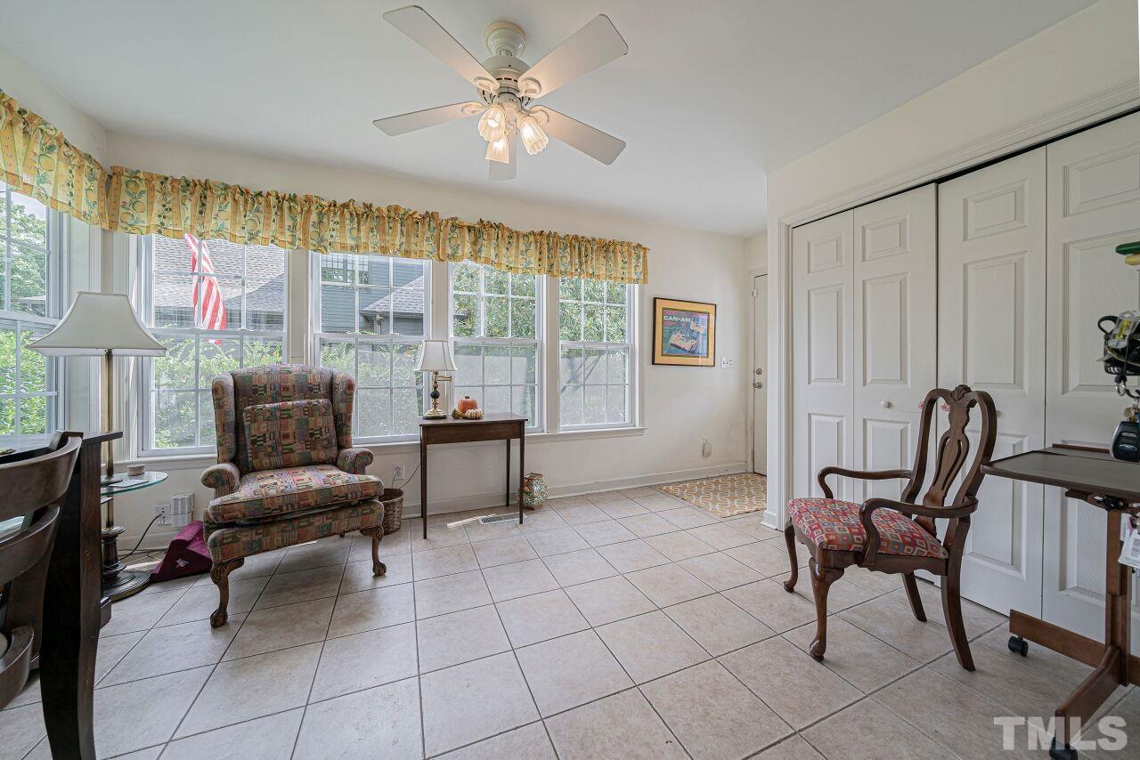 2617 Grant Avenue Raleigh, NC 27608 - Photo 21 of 28 a living room with furniture and a large window