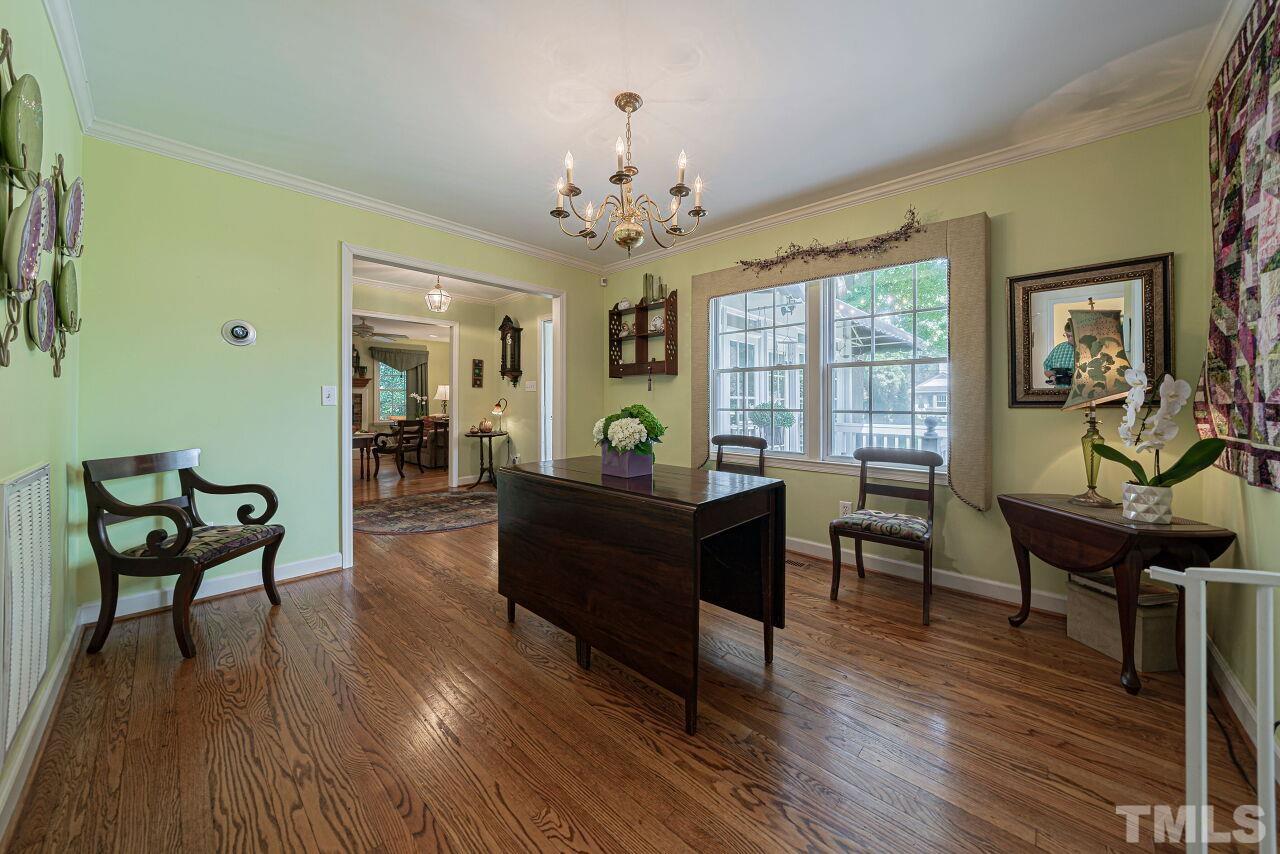 2617 Grant Avenue Raleigh, NC 27608 - Photo 8 of 28 a living room with furniture and a wooden floor