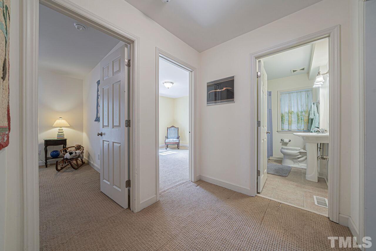 2617 Grant Avenue Raleigh, NC 27608 - Photo 10 of 28 a view of a livingroom with bathroom and a bathroom