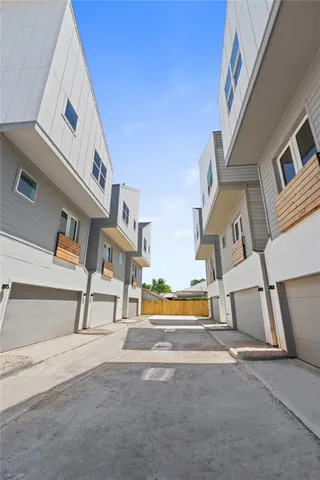 a black and white photo of a bench