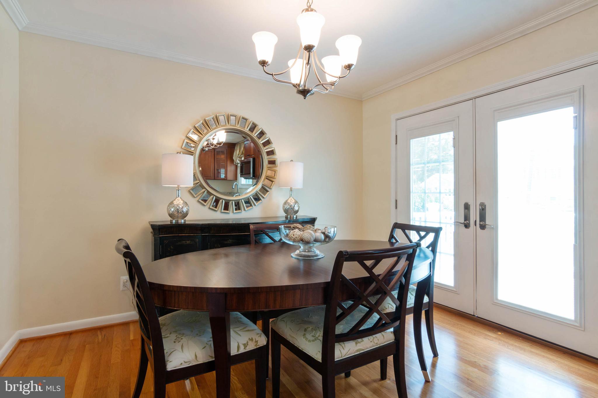111 Ardoon Road Lutherville-Timonium, MD 21093 - Photo 11 of 44 Dining Room Atrium Door to Trex Deck