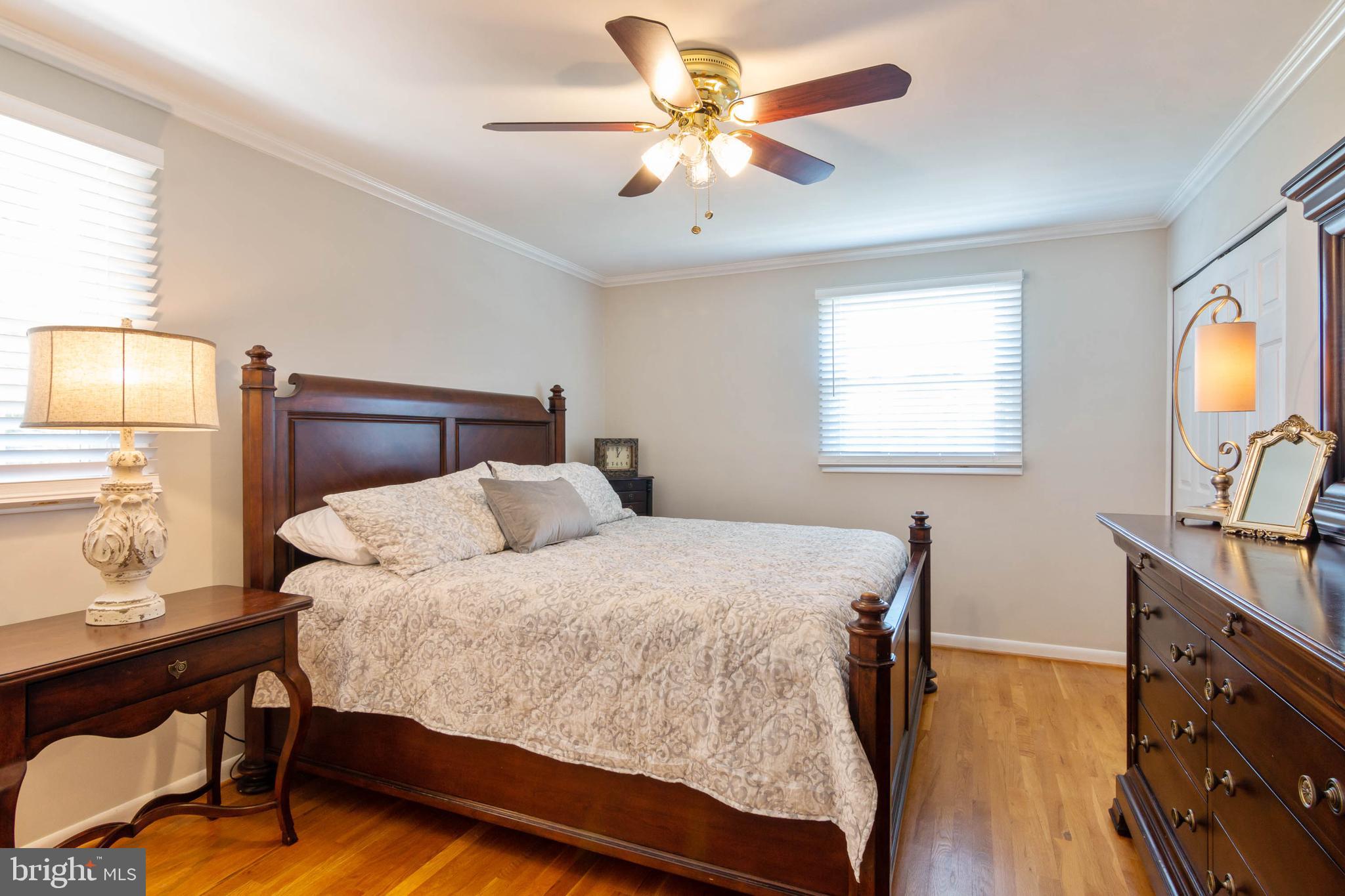 111 Ardoon Road Lutherville-Timonium, MD 21093 - Photo 17 of 44 Master Bedroom-Hardwood Floors & Ceiling Fan Light