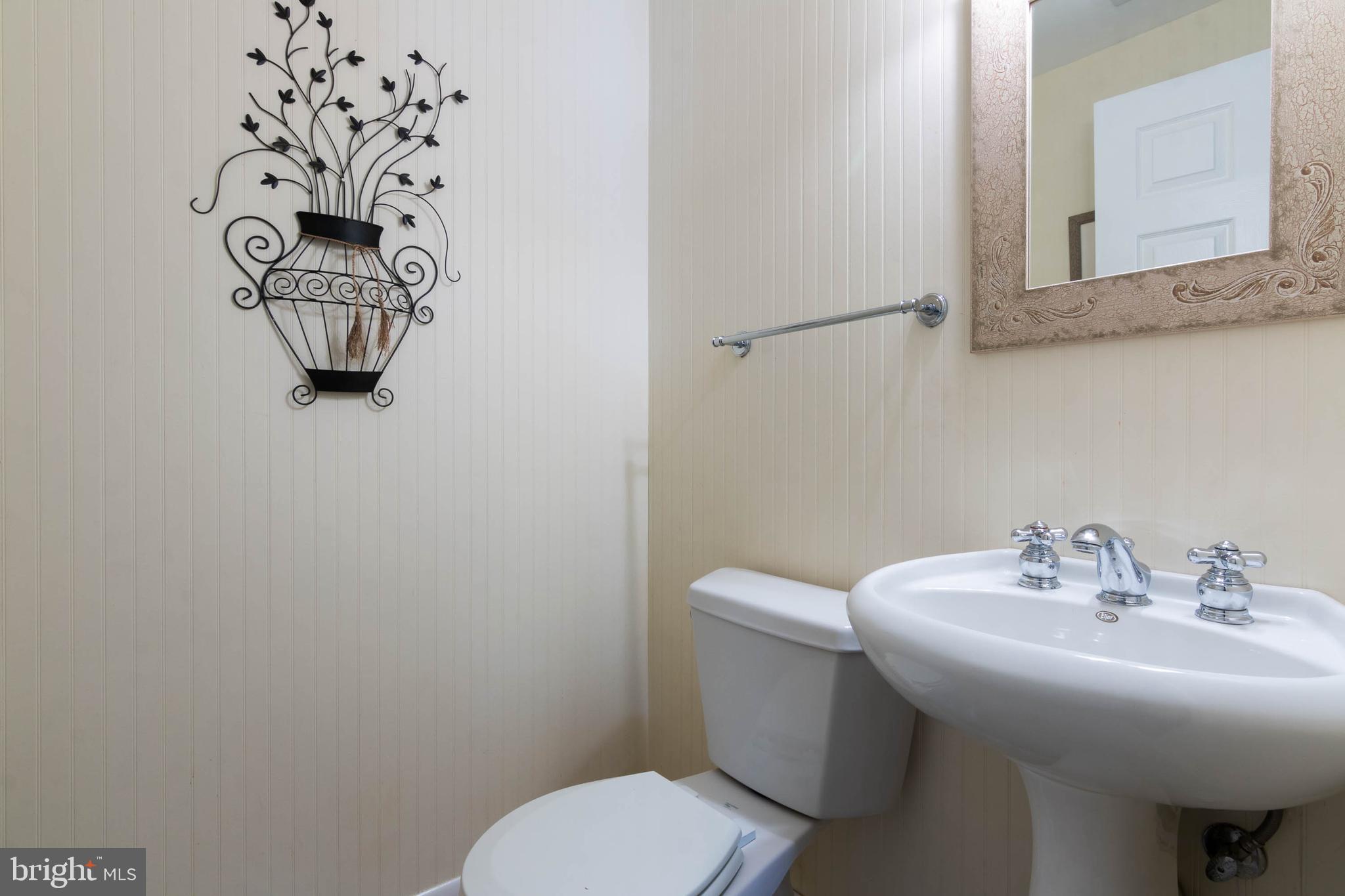 111 Ardoon Road Lutherville-Timonium, MD 21093 - Photo 35 of 44 Powder Room Located of Family Room