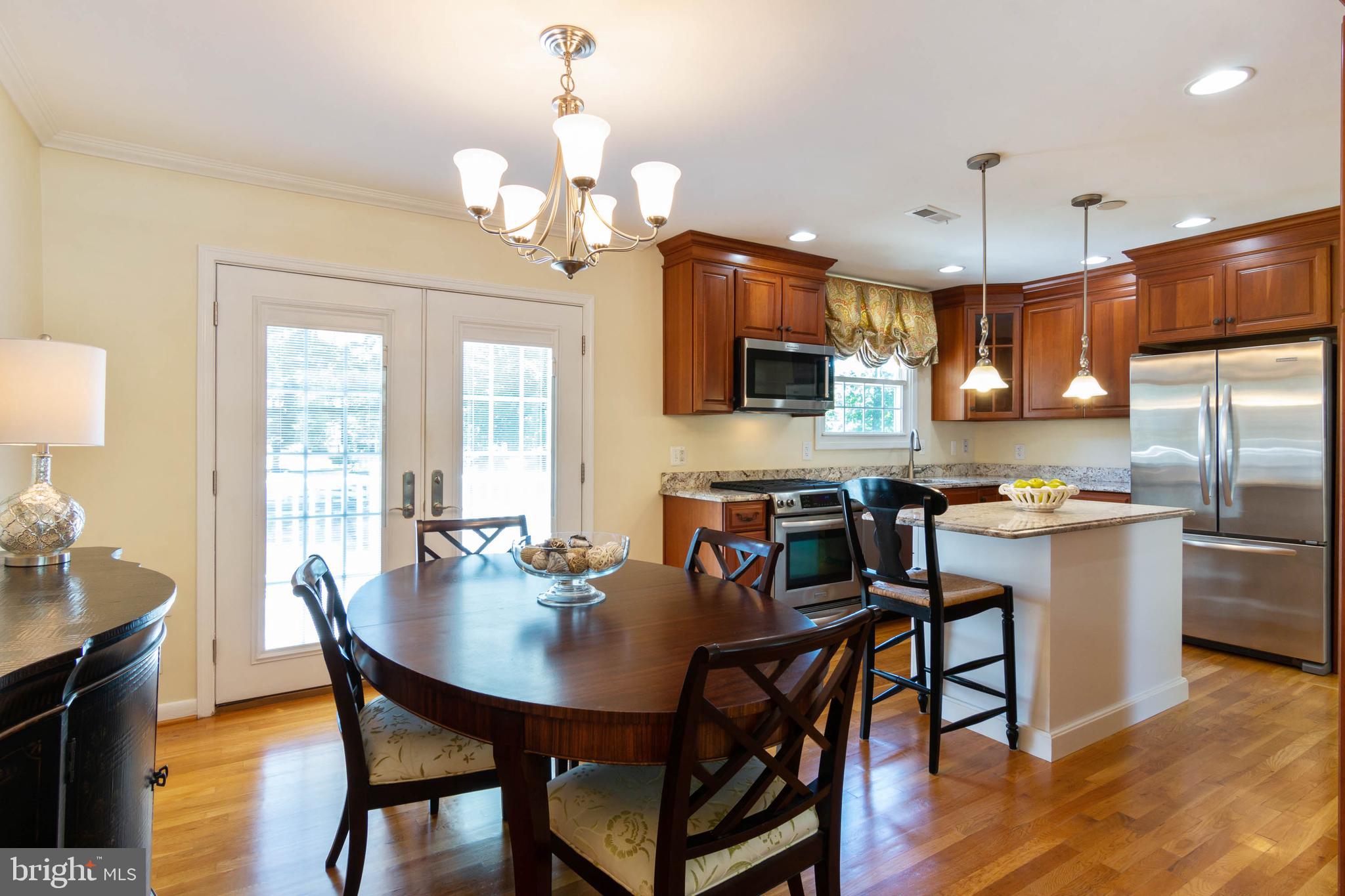 111 Ardoon Road Lutherville-Timonium, MD 21093 - Photo 10 of 44 Open Kitchen / Dining Room-French Door to Deck