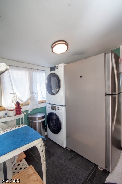 70 South Shore Road Andover, NJ 07821 - Photo 13 of 25 a bed room with a bed and a closet