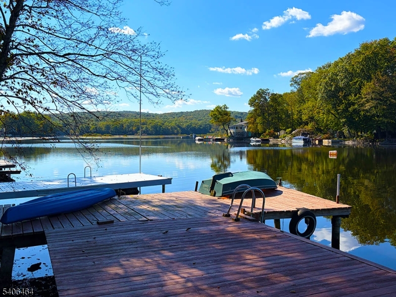 70 South Shore Road Andover, NJ 07821 - Photo 2 of 28 a view of a lake with sitting area