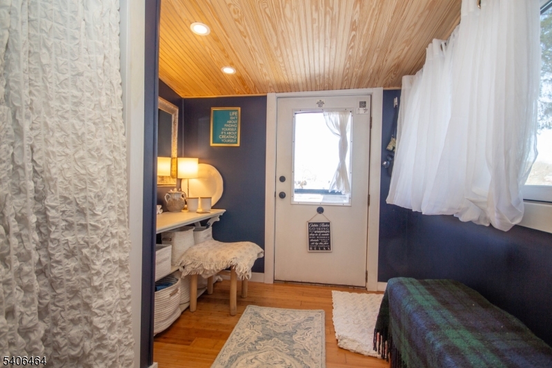 70 South Shore Road Andover, NJ 07821 - Photo 8 of 25 a bedroom with furniture and a window