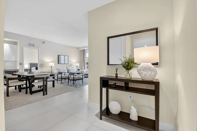 a bedroom with a bed and flat screen tv