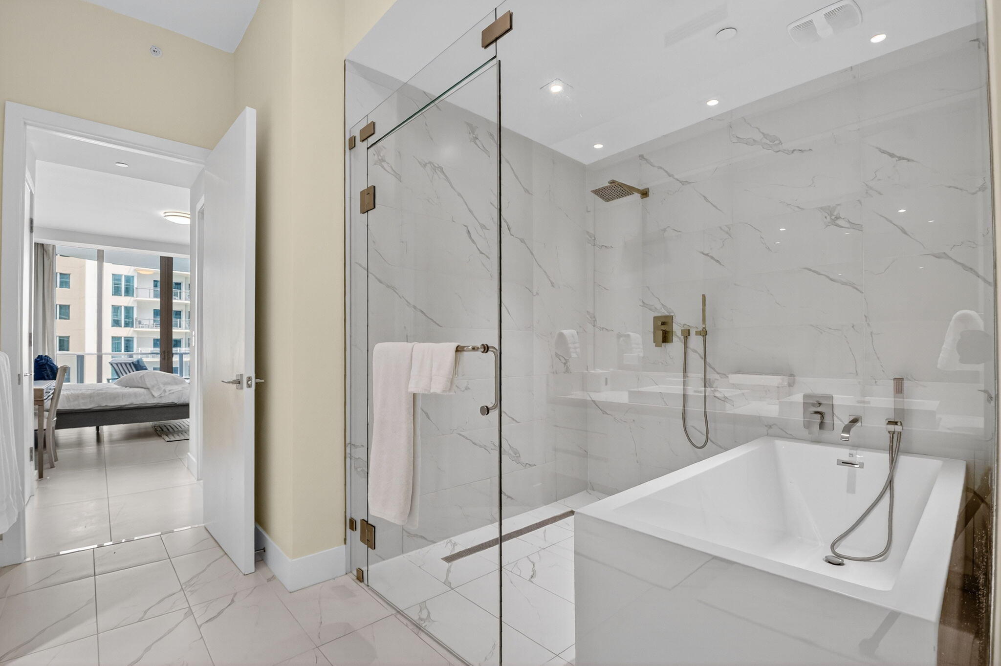 3100 North Ocean Drive, Unit 1210H Singer Island, FL 33404 - Photo 27 of 93 a bathroom with a sink a toilet and shower