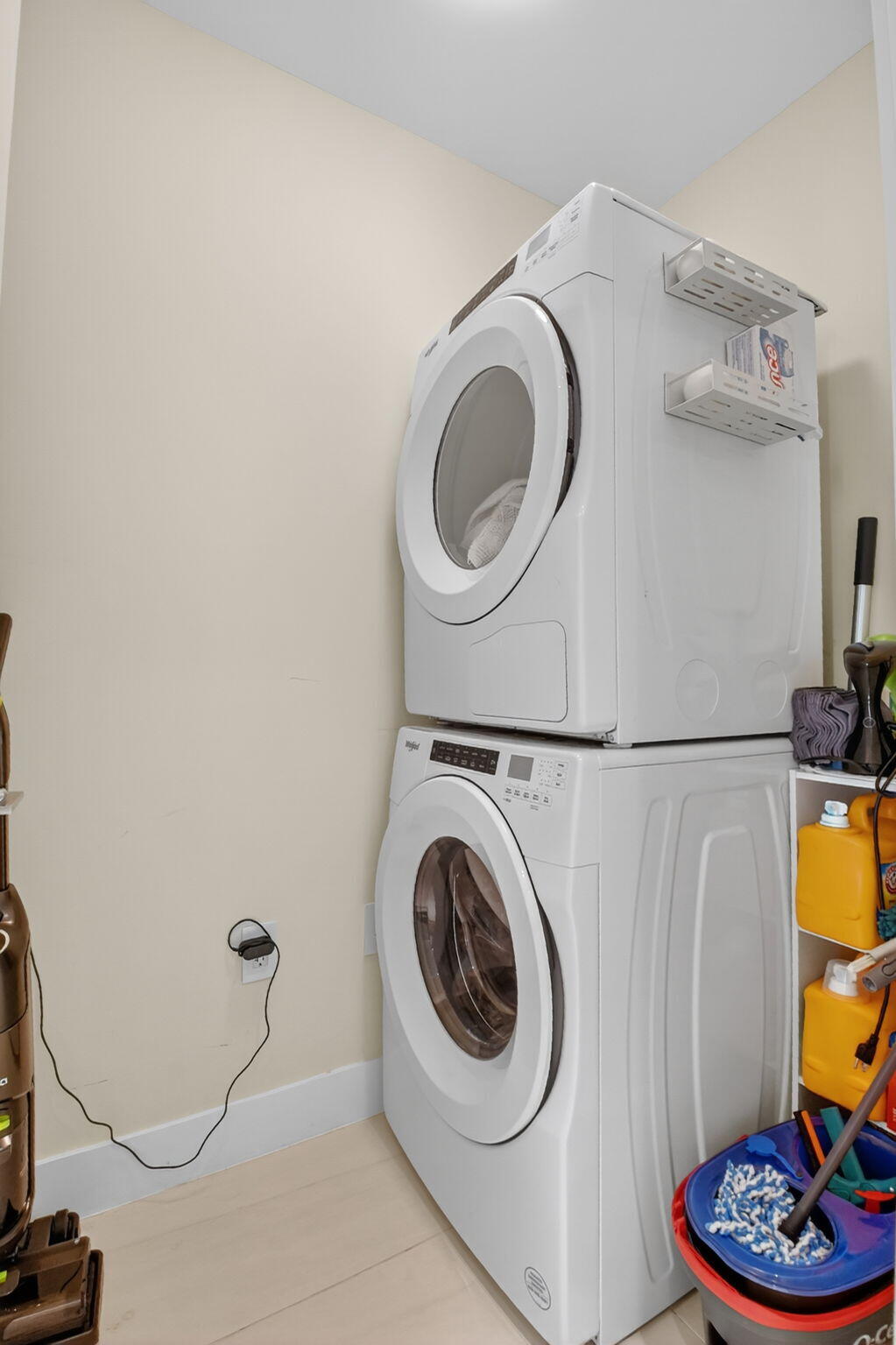 3100 North Ocean Drive, Unit 1210H Singer Island, FL 33404 - Photo 40 of 93 a utility room with dryer and washer