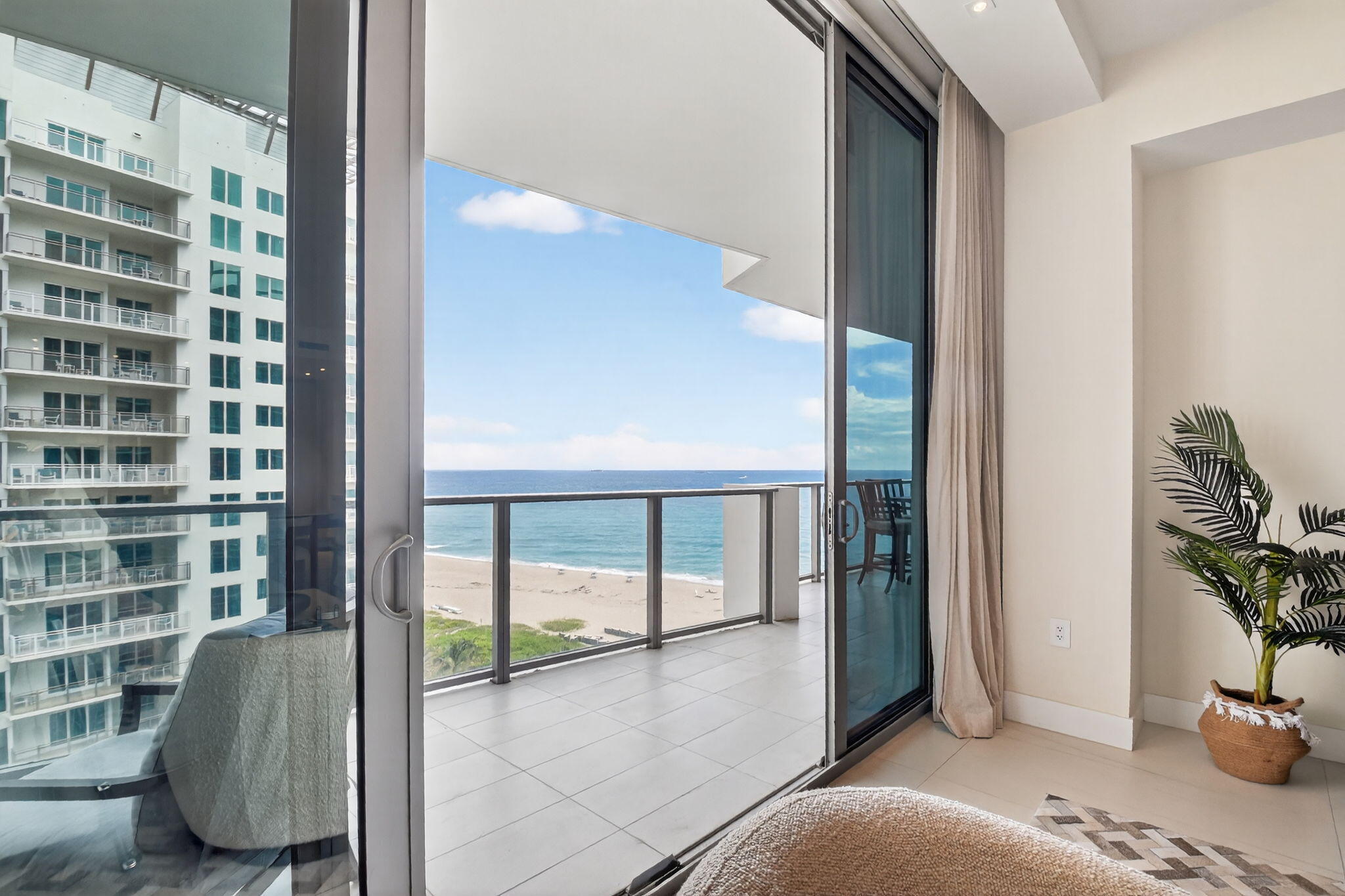3100 North Ocean Drive, Unit 1210H Singer Island, FL 33404 - Photo 4 of 93 a view of a living room and a balcony