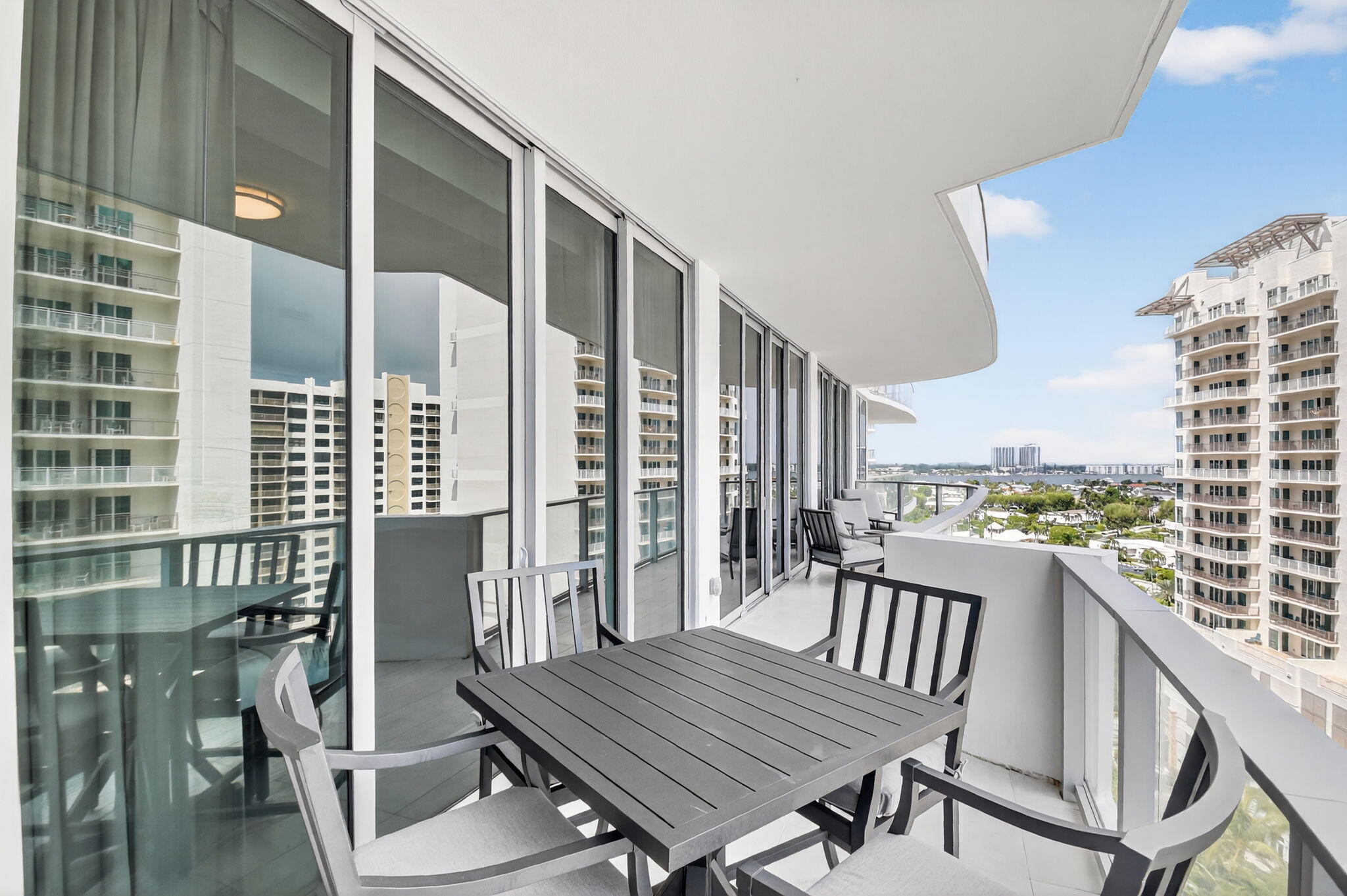 3100 North Ocean Drive, Unit 1210H Singer Island, FL 33404 - Photo 46 of 93 a view of a balcony with wooden floor