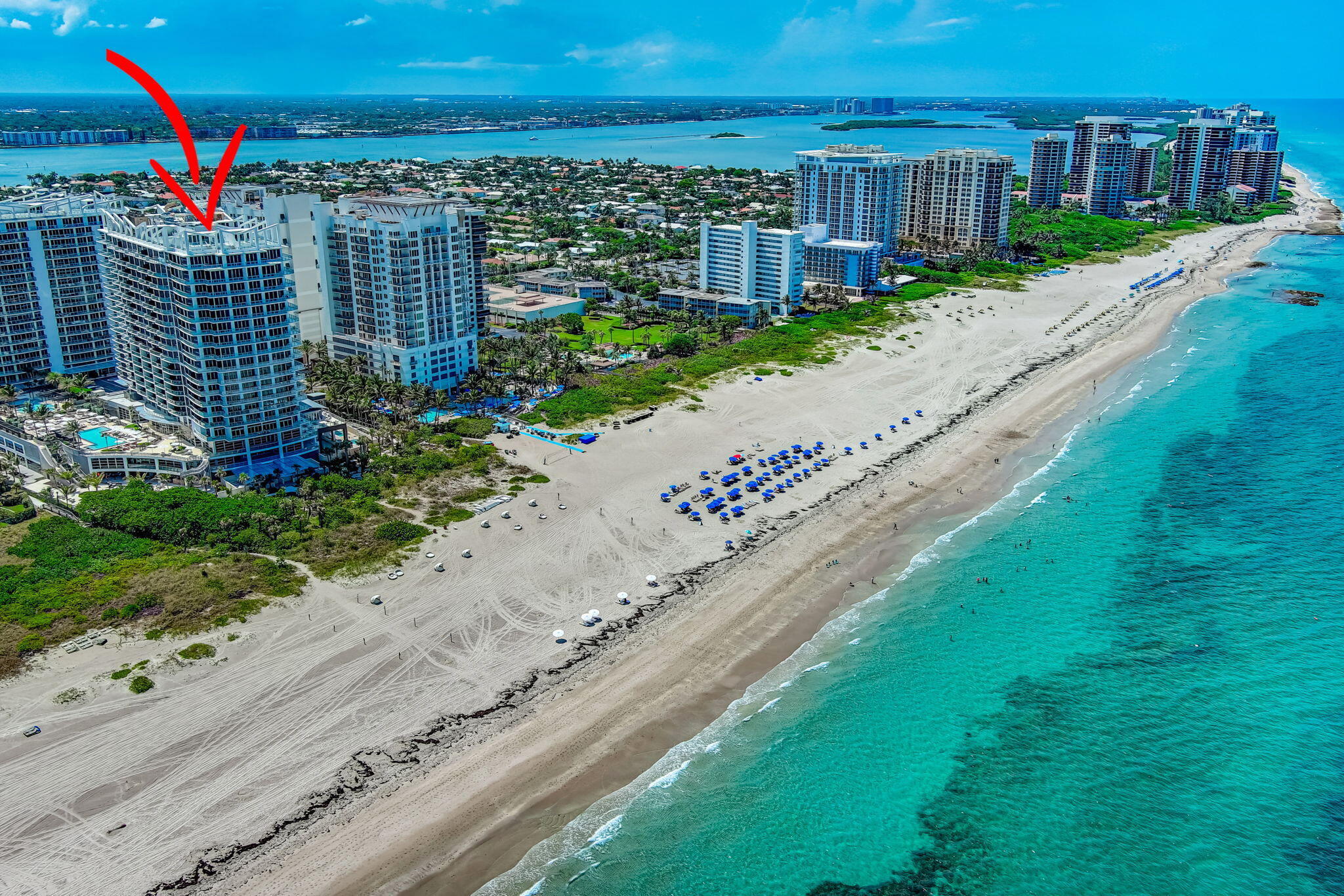 3100 North Ocean Drive, Unit 1210H Singer Island, FL 33404 - Photo 58 of 93 a view of a city with tall buildings and a big yard with potted plants