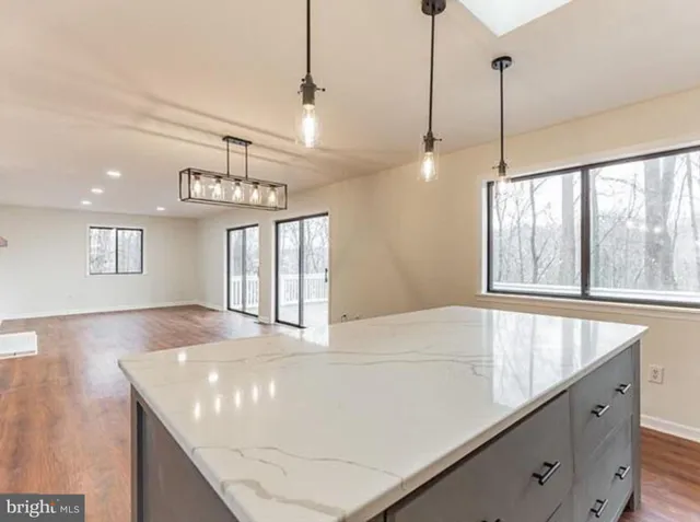 a view of an empty room and window