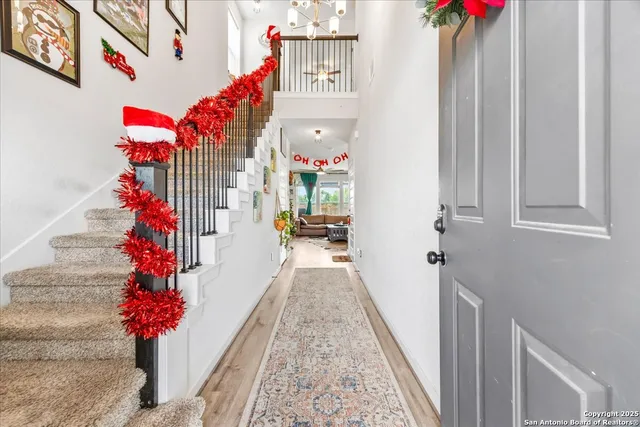 a view of entryway with flower pots