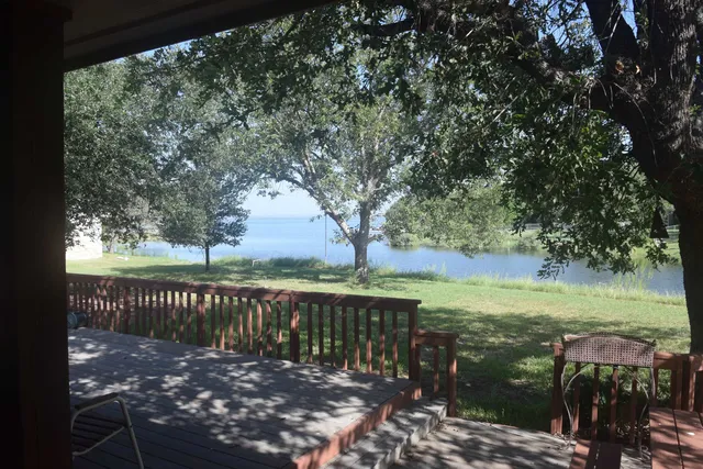 a view of a pathway with a yard