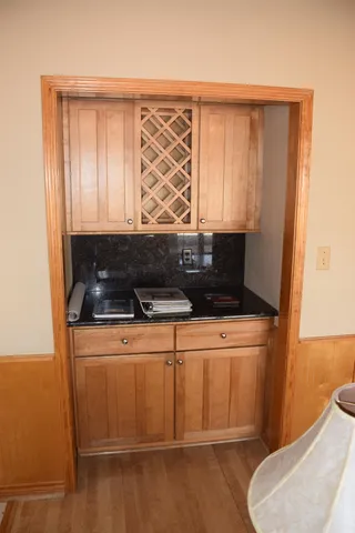 a bathroom with a sink a toilet and a window