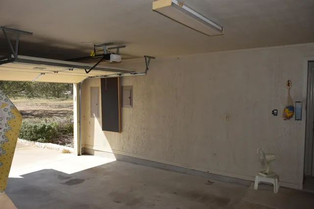 a view of a room with wooden walls