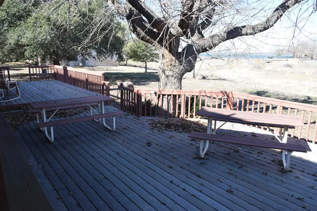 a view of a chairs on the deck