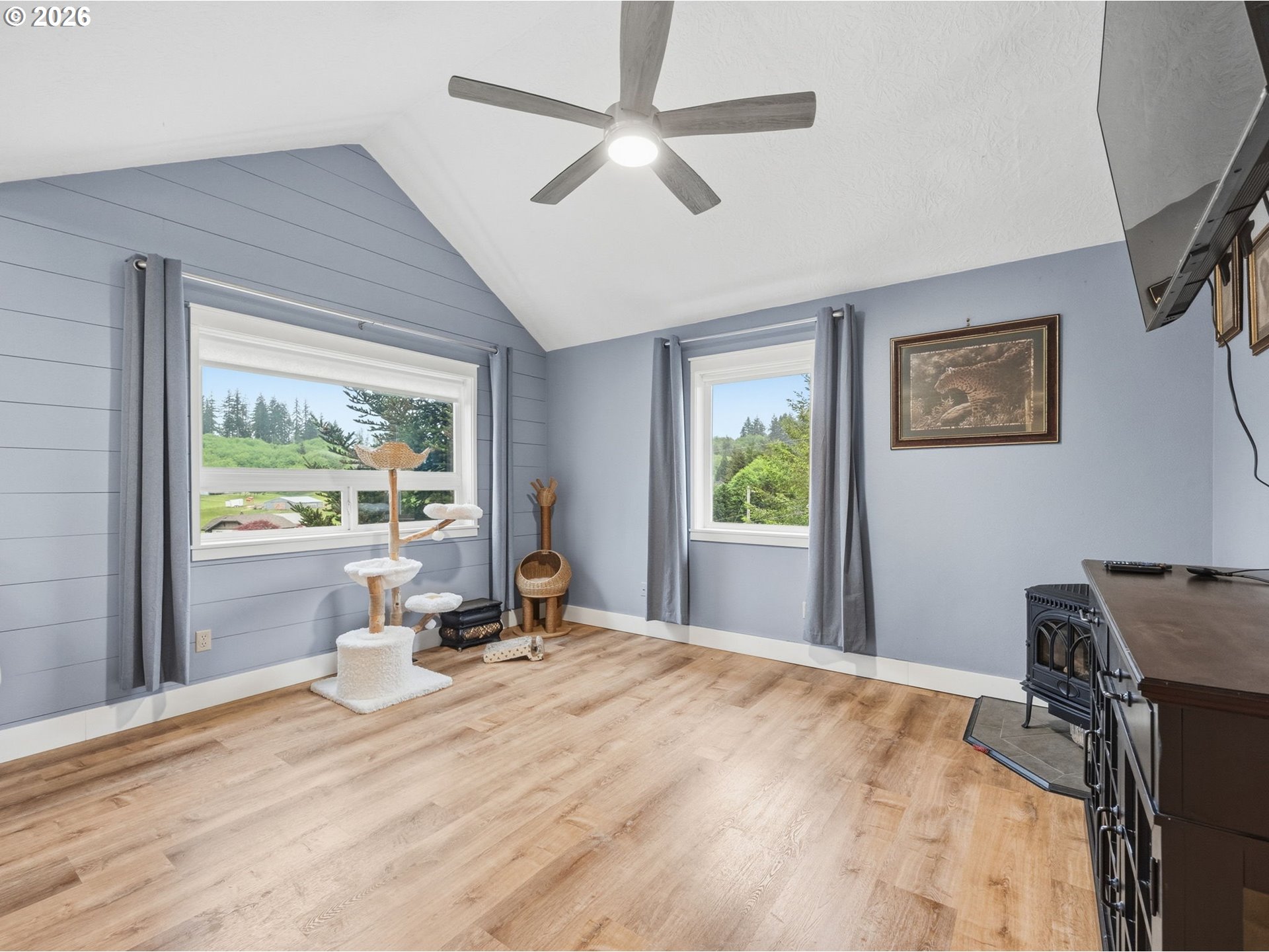 92085 Akerstedt Road Astoria, OR 97103 - Photo 8 of 48 a bed room with a bed and a window