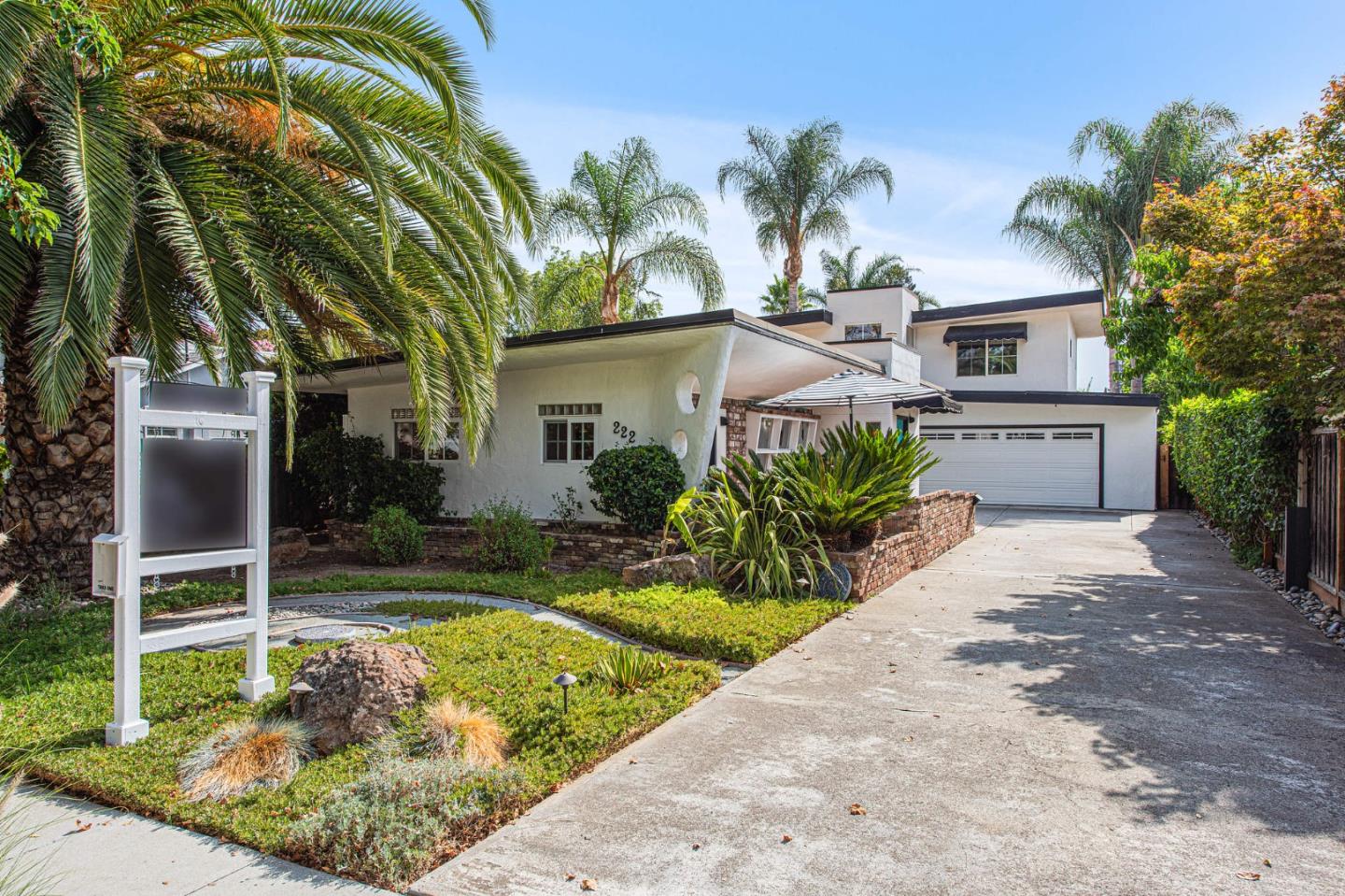 222 North 3rd Street Campbell, CA 95008 - Photo 1 of 35 a front view of a house with a yard and potted plants