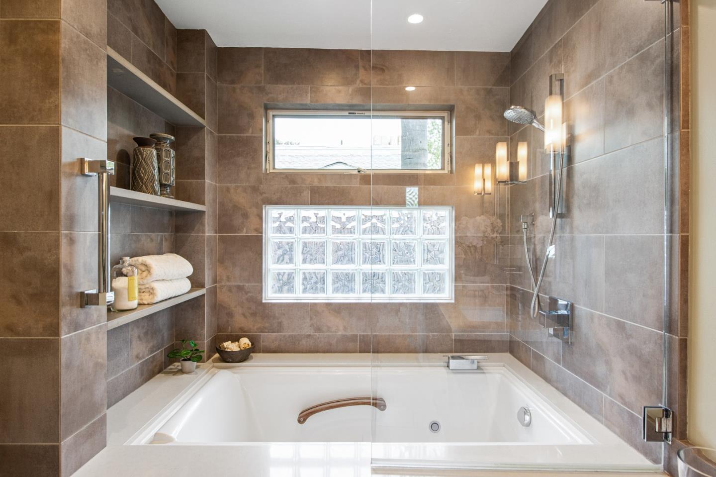 222 North 3rd Street Campbell, CA 95008 - Photo 14 of 35 a bathroom with a bathtub and a shower
