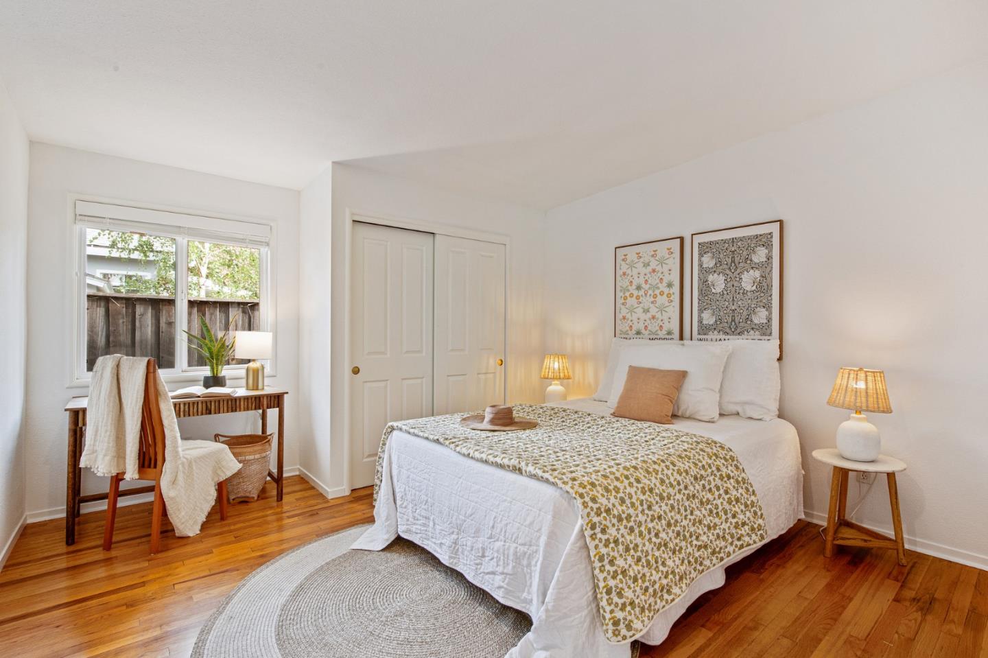 222 North 3rd Street Campbell, CA 95008 - Photo 16 of 35 a bedroom with a bed a table and three windows