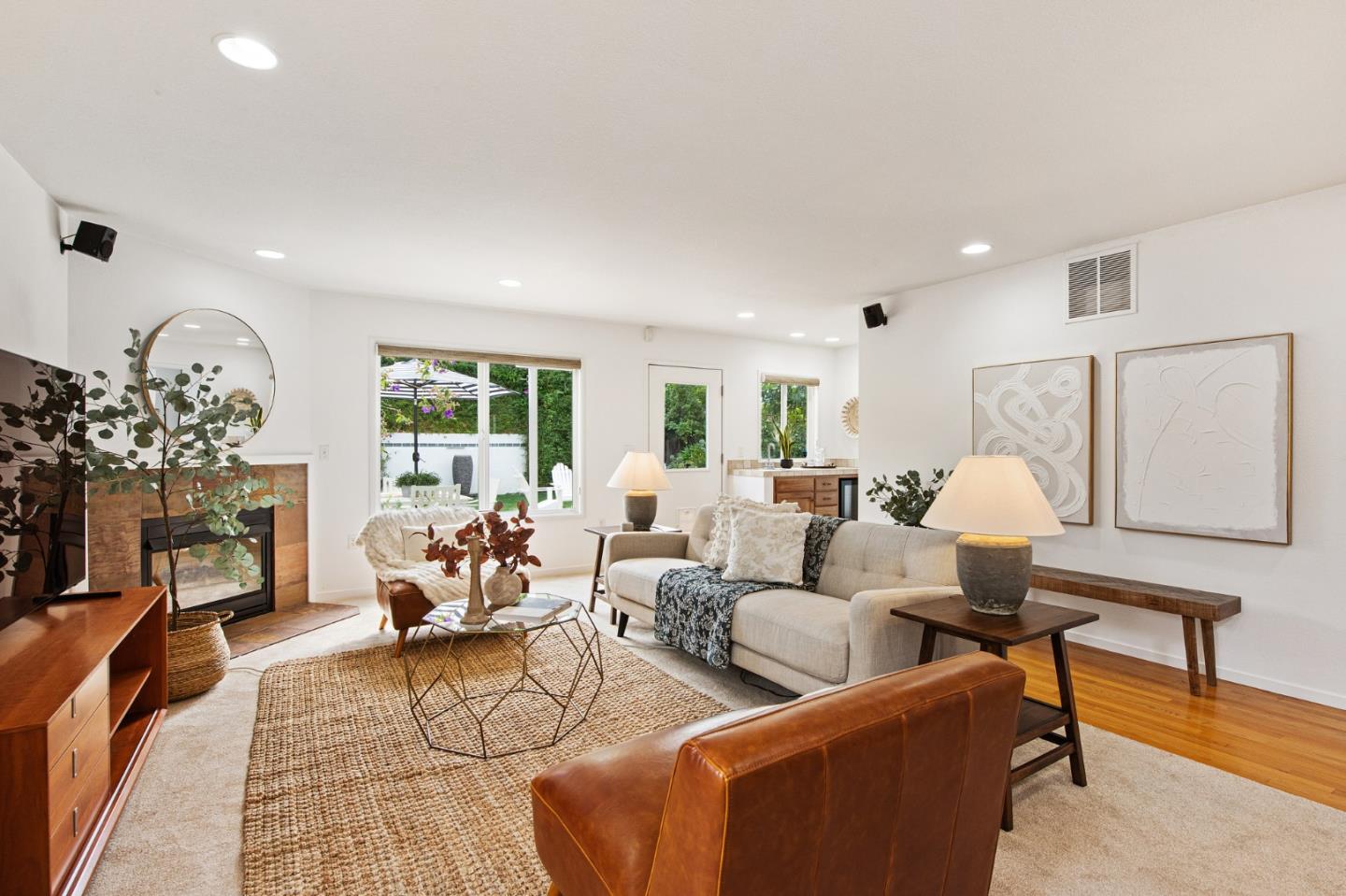 222 North 3rd Street Campbell, CA 95008 - Photo 18 of 35 a living room with furniture a fireplace and a chandelier