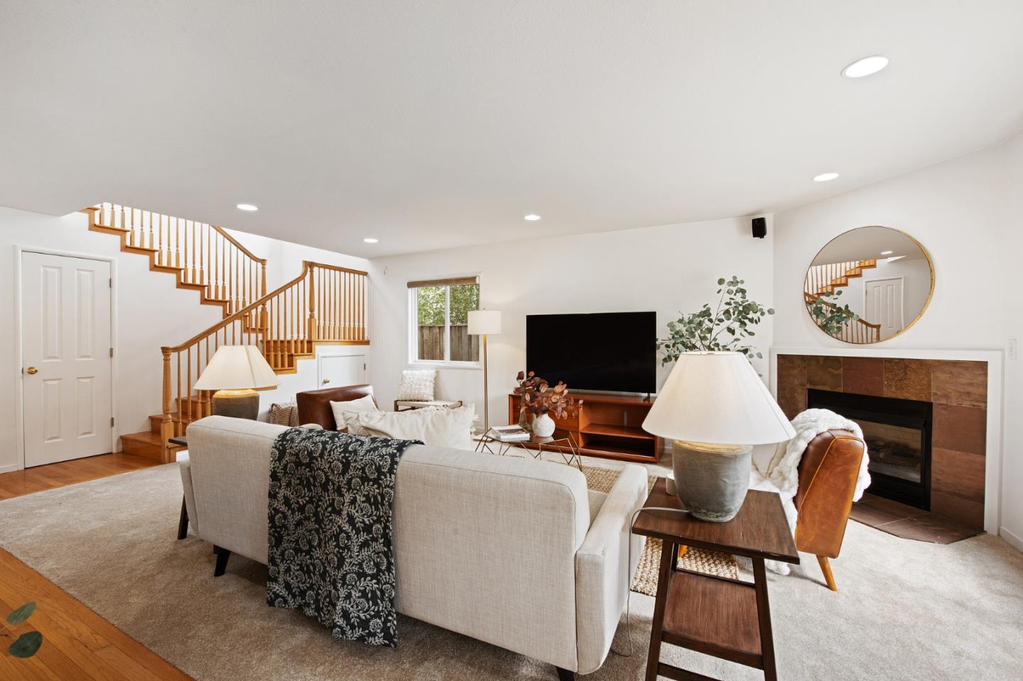 222 North 3rd Street Campbell, CA 95008 - Photo 20 of 35 a living room with furniture a rug and a flat screen tv