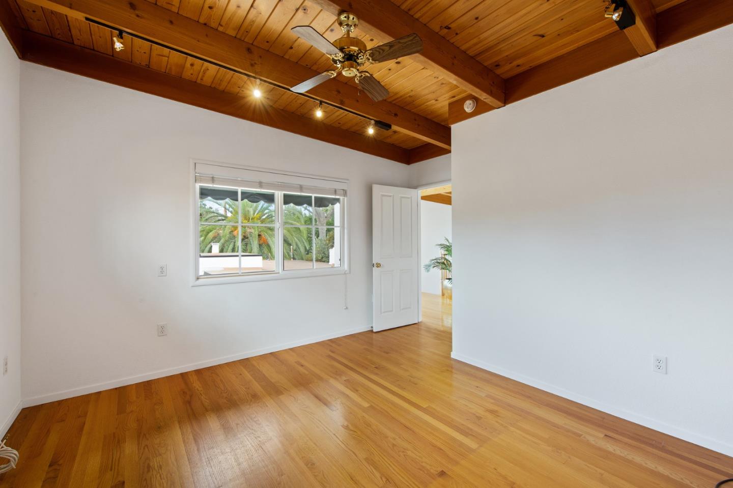 222 North 3rd Street Campbell, CA 95008 - Photo 26 of 35 a view of empty room with wooden floor and fan